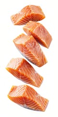 Falling sliced ​​salmon on white background