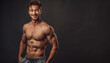 © Alienmonster Images - Portrait of a fit, muscular young man with a confident smile, showcasing health and fitness
