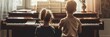 © Sarbinaz Mustafina - Two children are sitting on a piano bench