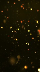 Wall Mural - vertical golden showers abstract background 4k loop features golden glowing coins or confetti fallin