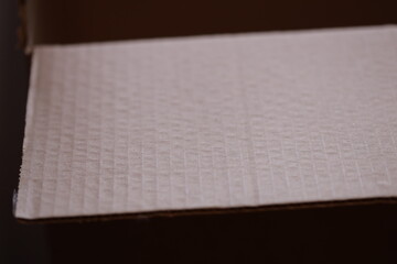 Canvas Print - Close-up view of a piece of paper inside a box, suitable for use in educational or professional settings.