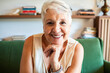 © Geber86 - Smiling elderly woman portrait in a living room