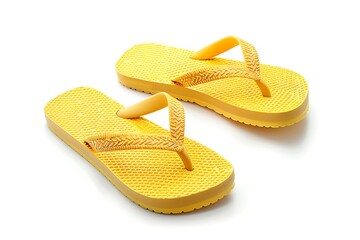 Pair of yellow flip flops on white background