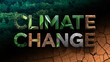 © Rodrigo - 'Climate Change' text made from natural materials like leaves, wood, and cracked earth, set against a split background of lush green forest and barren, dry soil, symbolizing the environmental effects