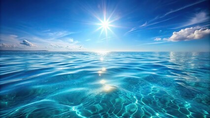 Wall Mural - clear blue ocean with sunlit ripples reflected