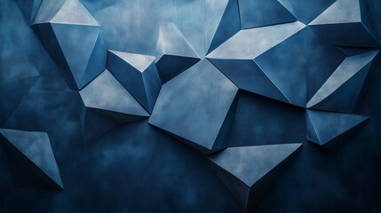 Poster - A blue wall with angular, abstract shapes in shades of grey and navy, resembling folded paper or origami forms