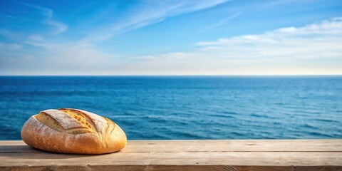 Minimalist bread and baked goods on a table by the sea