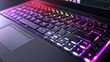 © Imsuniyah - Close-up of a Black Laptop Keyboard with Colorful Backlighting