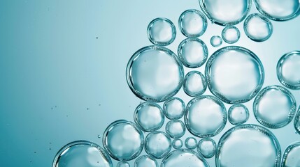 Wall Mural - Stunning closeup of sparkling water bubbles, showcasing their delicate surface tension against a crisp blue backdrop.