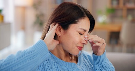 Wall Mural - Woman, headache and stress on sofa in house with brain fog, dizzy and tension from exhaustion. Person, migraine and uncomfortable pressure with vertigo, fatigue and overwhelmed with burnout in lounge