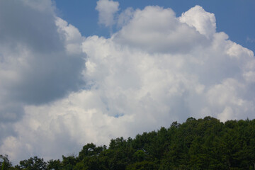 Canvas Print - 
Sky with clouds and summer mountains