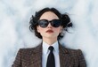 © Balaraw - stylish woman in sunglasses and suit