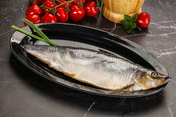 Whole raw salted herring fish