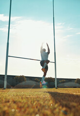 Poster - Rugby, man and jump at posts for sport, catch and intense fitness game on field. Athlete, active or energy at goal poles for competition, professional tournament or World Cup event on pitch in summer