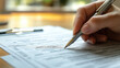 © AIrina - Close-up of hand signing document with pen