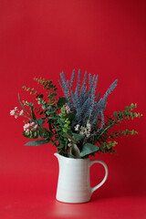 Christmas Concept, , A bouquet of flowers in a white Vase