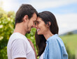 © FotoPush/peopleimages.com - Happy, nature and couple with love in park on romantic date for vacation, getaway or weekend trip. Smile, hug and young man and woman with connection, care and bonding outdoor in garden on holiday.