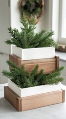 Wall Mural - Three elegantly wrapped Christmas presents adorned with greenery, pinecones, and wood accents sit on a wooden table, enhancing the festive cheer in a cozy holiday atmosphere