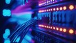 © Oatkhaphon - A close-up of illuminated server connections and cables, showcasing vibrant lights and a modern technological design.