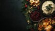 © narak0rn - Festive holiday meal with roasted vegetables, mashed potatoes, and cranberry sauce on a dark background.