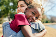 © TamJam/peopleimages.com - Hug, love and adoption with interracial family in nature for foster care, bonding and support. Child welfare, placement success and security with mother and girl in outdoors for happiness together