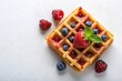 © suchetpong - Minimalist waffle with strawberry raspberry and blueberry jam