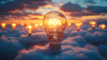Poster - Illuminating creativity, this image features glowing light bulb surrounded by soft clouds at sunset, evoking sense of inspiration and wonder