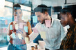 © Malambo/peopleimages.com - Planning, writing and business people in office for brainstorming, discussion and teamwork. Creative company, startup and men and women with sticky notes for collaboration, research and project idea