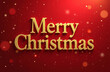 © Georgiy - Beautiful golden sparkling Merry Christmas lettering with glitter on red background with bokeh. Holiday greeting card.