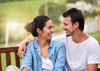 Poster - Happy couple, hug and conversation with love on bench for date, holiday or outdoor weekend in countryside. Young, man and woman with smile in relax for romance, embrace or morning together on porch