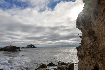 Heart-shaped rock formation off the Sutro Baths coast in San Francisco, offering a scenic view of the Pacific Ocean and natural beauty.