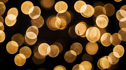 Poster - Golden Bokeh Lights: A mesmerizing backdrop of warm, golden bokeh lights dancing against a deep black canvas. Perfect for adding a touch of festive magic to your designs. 