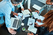 © SensSai/peopleimages.com - Notebook, hands and group of business people planning solution, discussion or kpi in office meeting. Laptop, sales manager and team together with profit data, budget increase or performance metrics