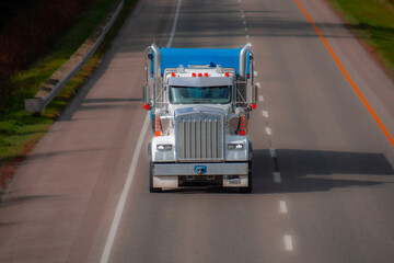 Wall Mural - Heavy truck on a Canadian highway in the fall in Quebec