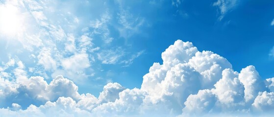 Wall Mural -  A clear blue sky dotted with white clouds A plane trails contrails as it flies through the mid-level clouds Sun gleams brightly at the sky's center