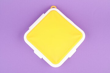 Wall Mural - Sandwich lunch box on lilac background, top view