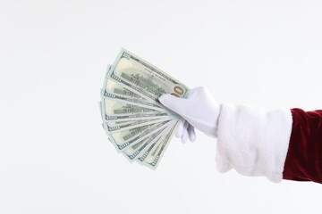 Santa Claus holding dollar banknotes on white background, closeup