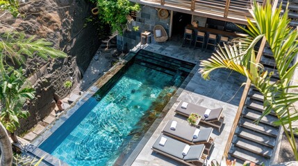 Poster - Scenic Aerial View of Modern Pool with Lush Surroundings