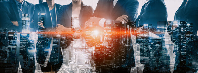 Wall Mural - double exposure image of many business people conference group meeting on city office building in ba