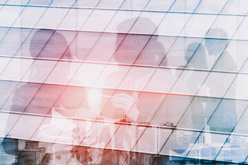 Wall Mural - double exposure image of faded business abstract background with office building and people conferen