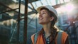 © PUTRI - A Smiling Female Construction Worker Wearing a Hard Hat