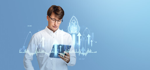 Poster - Professional man analyzing data on tablet with graphs and arrows