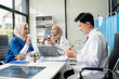 © Nuttapong punna - Medical, meeting and laptop for team in discussion, brainstorming and planning. Doctor, nurse on desk