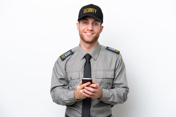 Wall Mural - Young safeguard caucasian man isolated on white background sending a message with the mobile