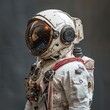 © PuiZera - Astronaut in a white spacesuit with a helmet.