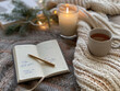 © Santy Hong - A reflective New Year celebration at home, with a journal, tea, and a focus on setting simple, achievable goals for the year
