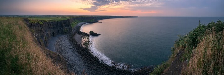 Poster - Golden sunset casts a warm glow over the cliffs and water, highlighting the serene beauty of the coastal landscape