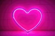 © RENDISYAHRUL - Neon light with a love shape over a dark background