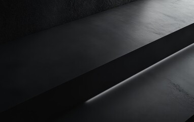 Wall Mural - A minimalist black surface with subtle lighting, creating a modern and sleek aesthetic.