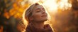 © logitech - Woman with closed eyes in golden light.